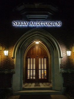 photograph of Neely Auditorium at night