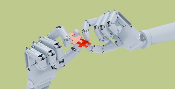 Robotic hands holding puzzle pieces