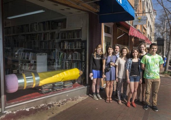 Class with giant pencil installation at bookstore