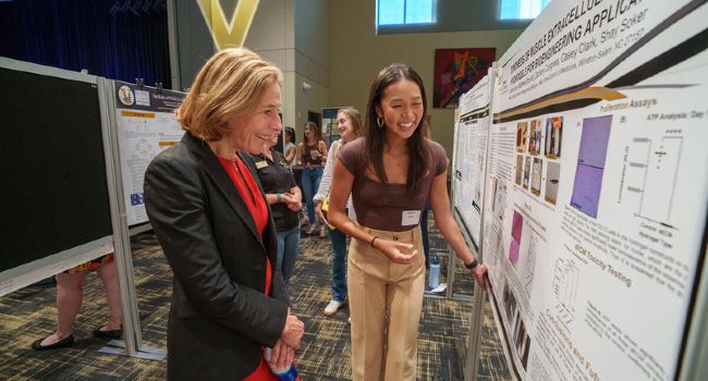 The annual showcase is a forum for undergraduate students to present research conducted across many different scholarly disciplines. Pictured left: Provost C. Cybele Raver