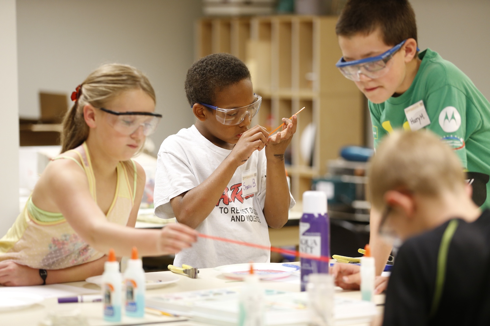 Young students combine art and science in a lab