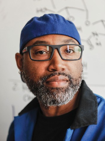 portrait shot of Steven Townsend wearing a blue ball cap backwards