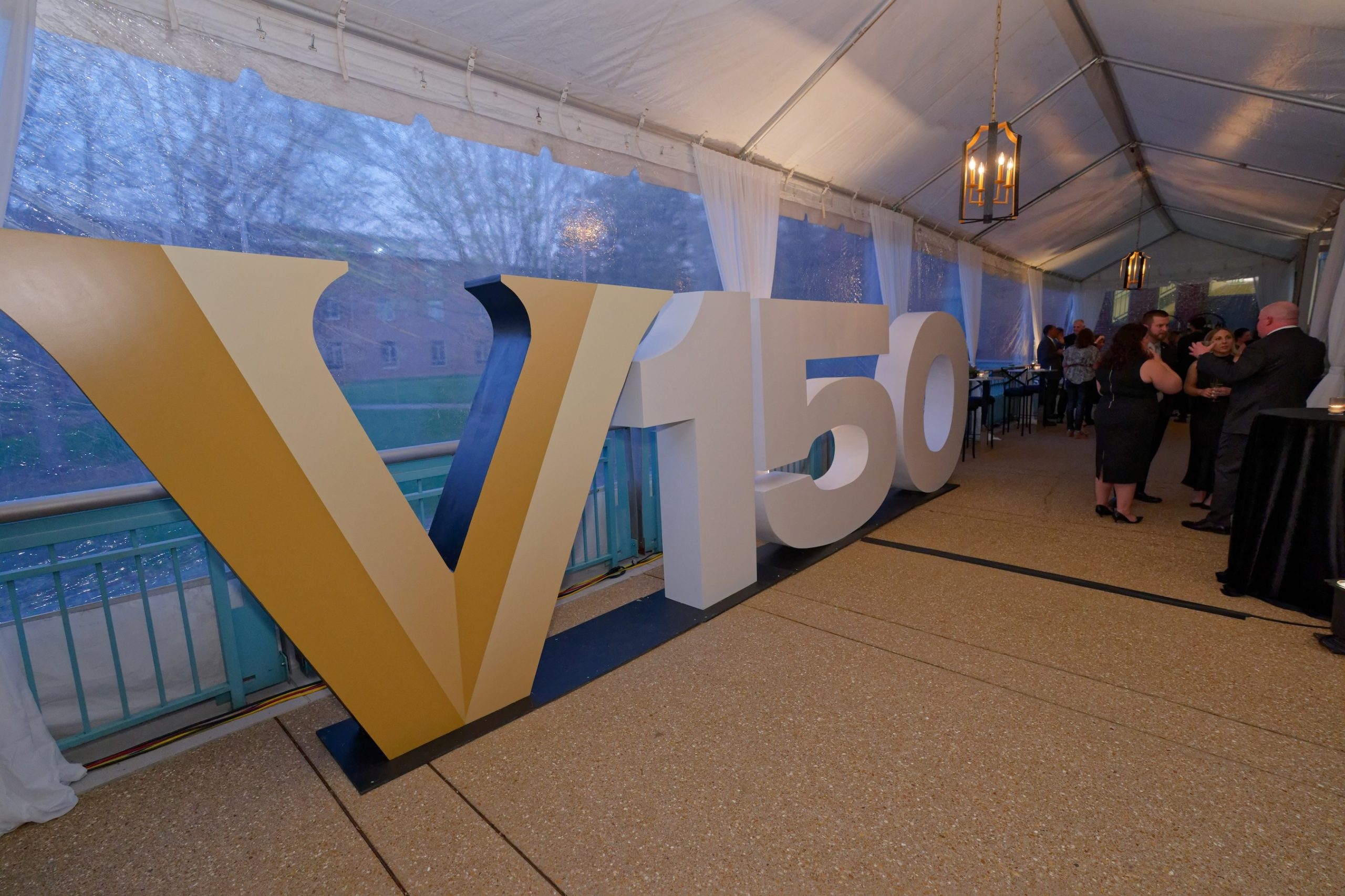 V150 signage at an event