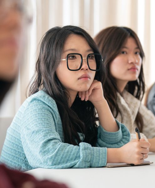 A Vanderbilt student takes notes during the spring break 2024 trek to Vanderbilt's New York City hub.