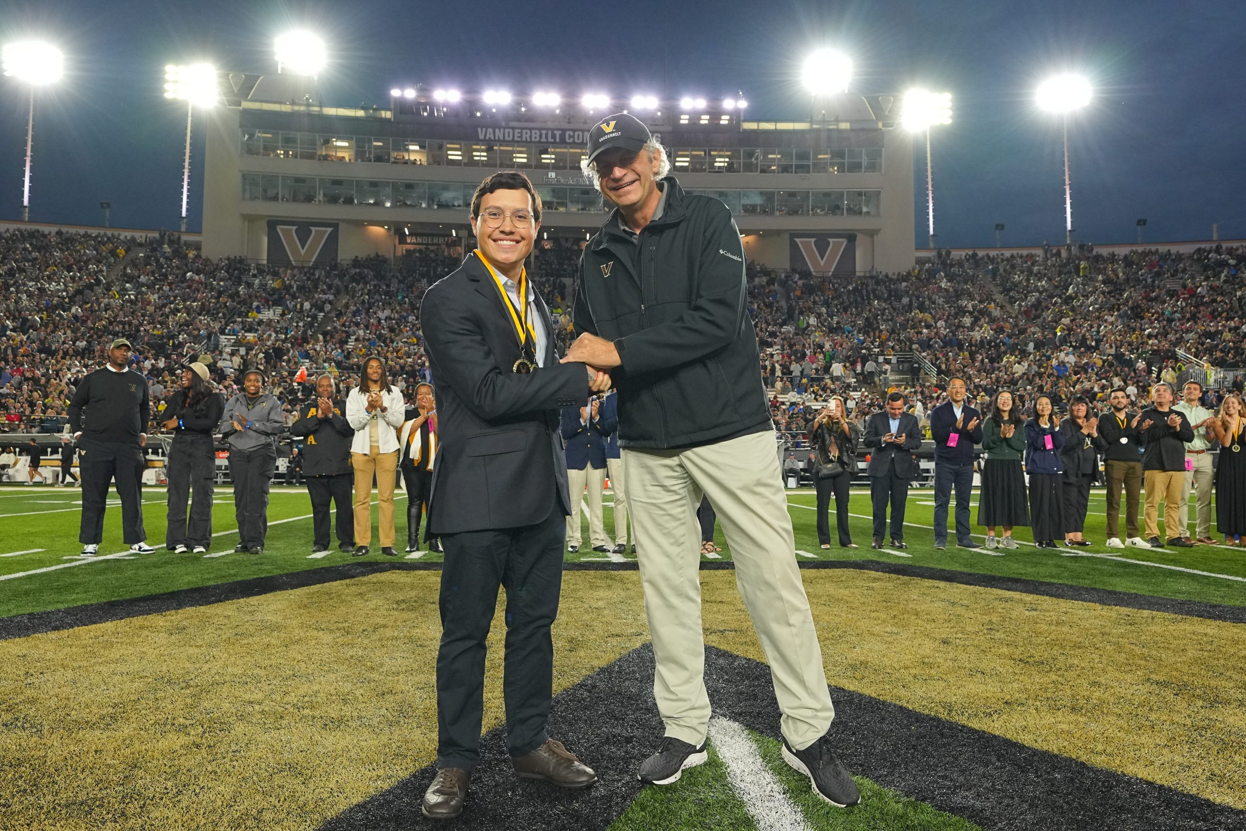 Class of 2025 Outstanding Senior Luis Enrique Otero and Chancellor Daniel Diermeier