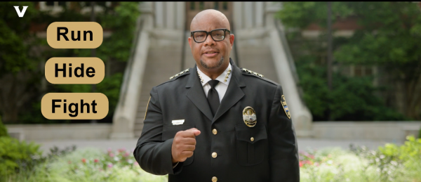 Chief Tommye Sutton teaching "Run, Hide, Fight" during the safety training video