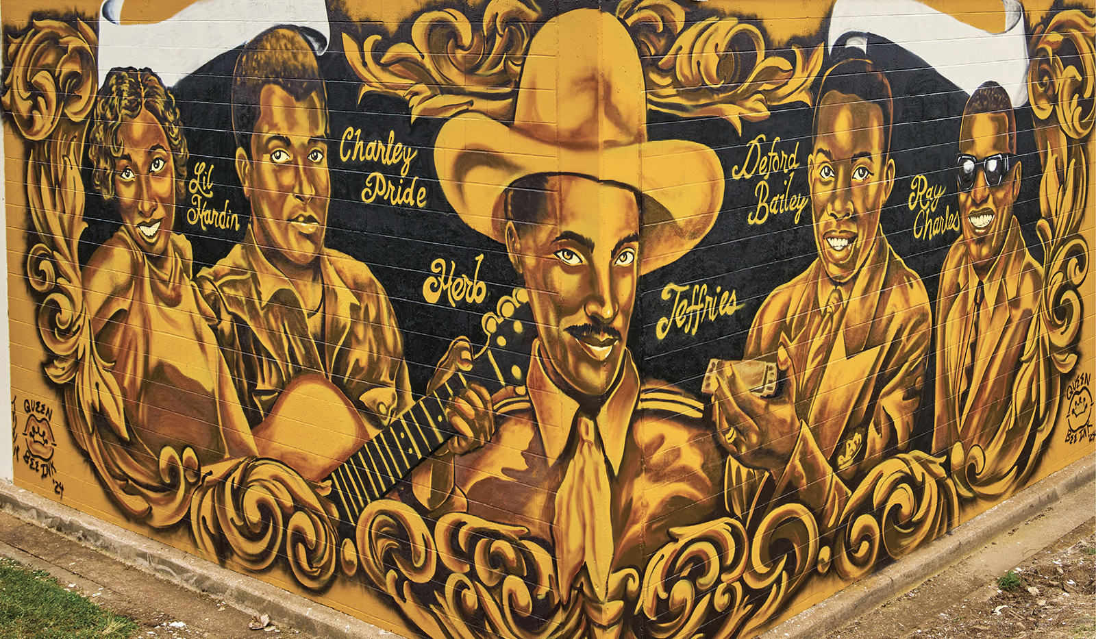 A gold, brown and black mural of five trailblazing Black country music stars spans two corners of Vanderbilt Printing Services on Chestnut Street in Nashville.