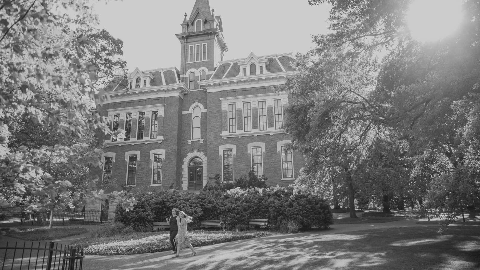 A black and white image of a building on campus