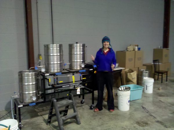 Bailey Spaulding and her first professional brew in 2009 (submitted photo)