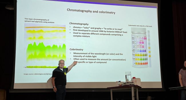 Stevenson Professor of Chemistry John McLean instructs Grundy County high school science students
