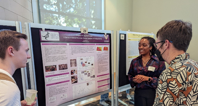 Kayla Prowell presents her poster during Undergraduate Research Fair