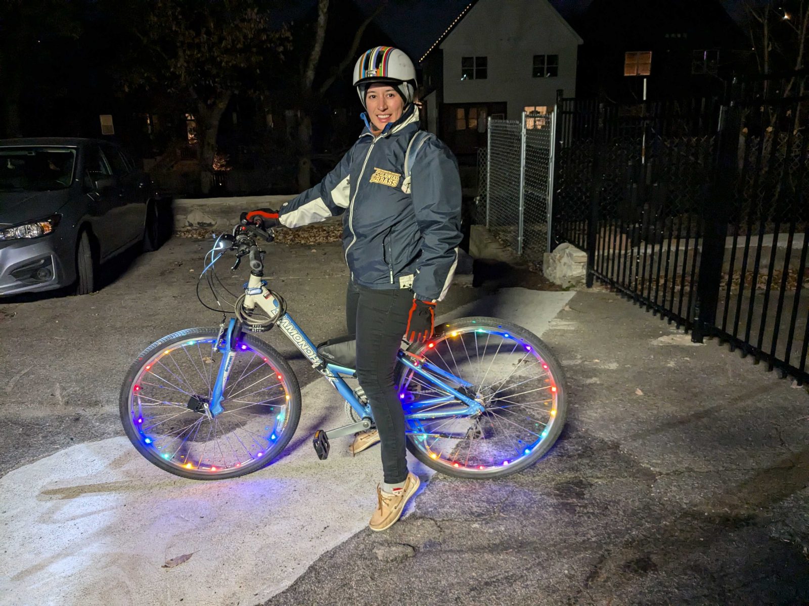 Woman riding bicycle with helment