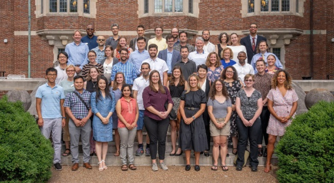 phtograph of 2021 new faculty members on steps of Alumni Hall