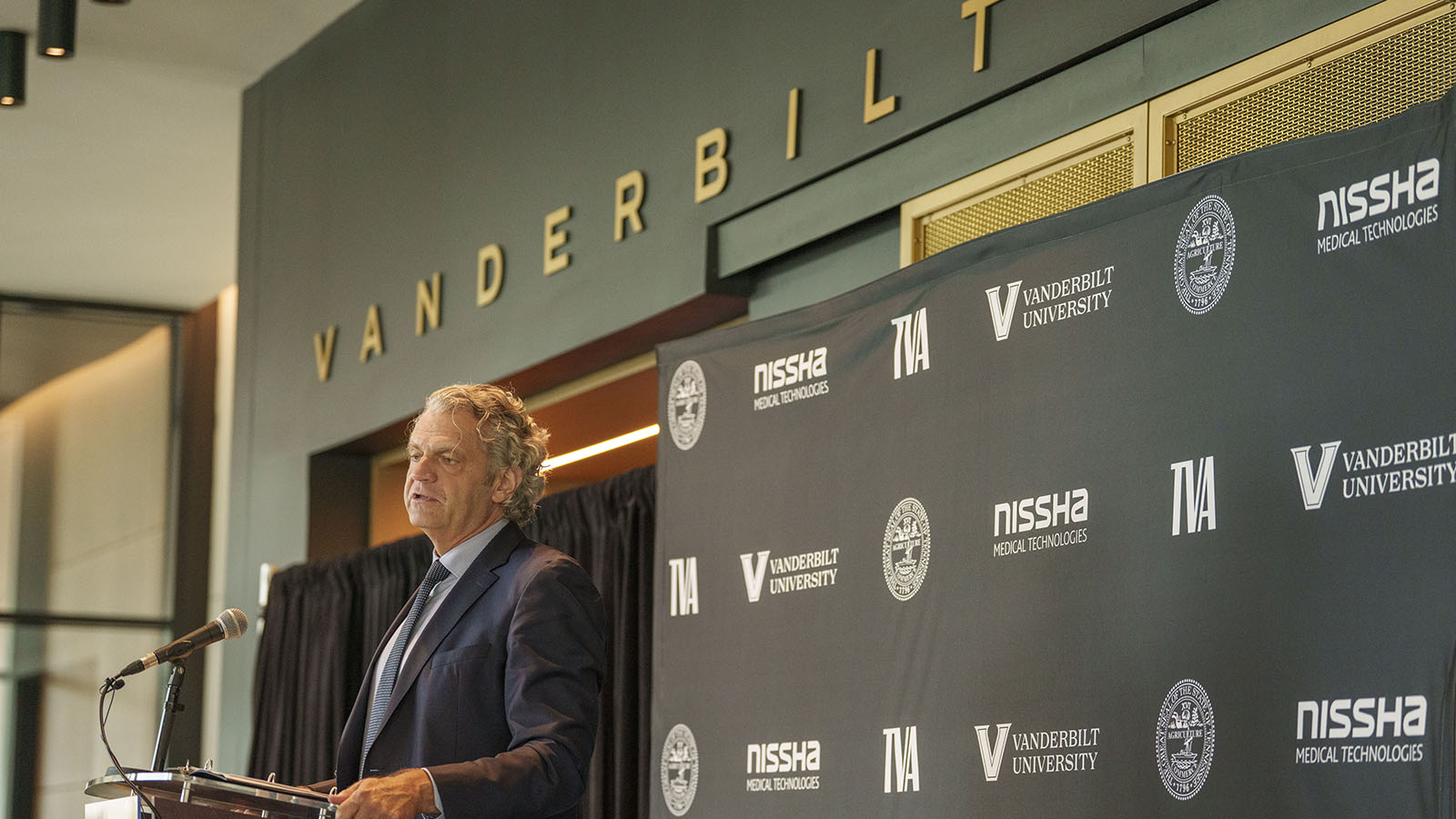 Chancellor Daniel Diermeier speaks at the Nissha news conference