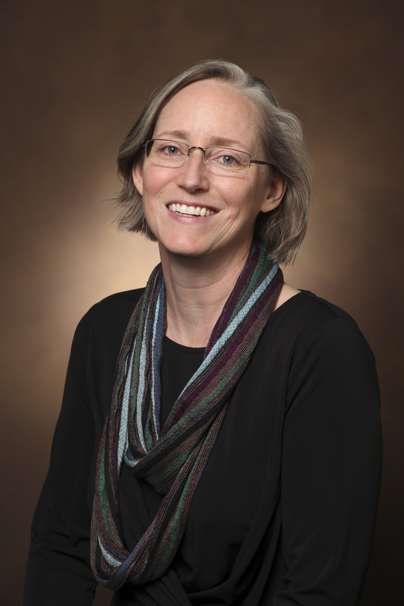 A woman wearing glasses