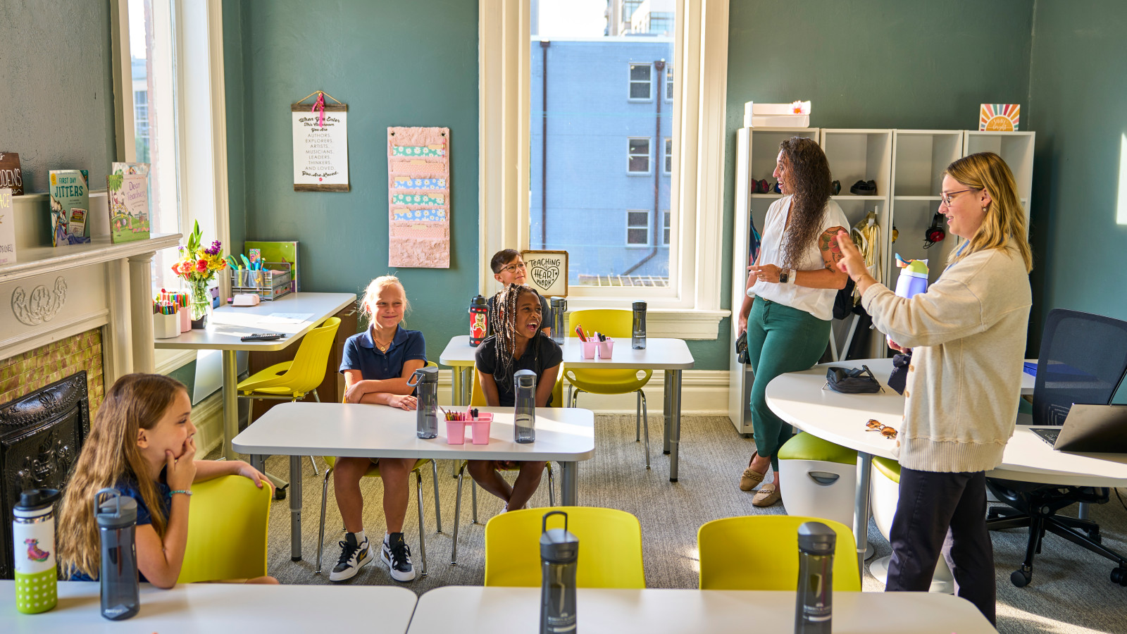 Photograph of Roberts Academy classroom with teachers and students on the first day of classes