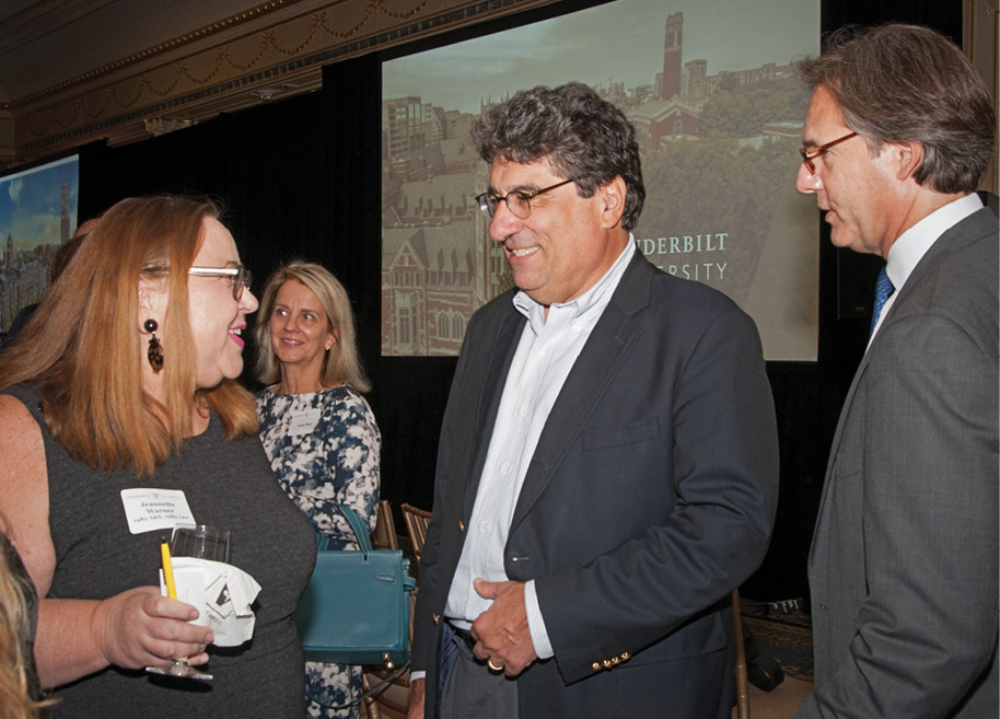 Chancellor Zeppos (center) chats with New York-area allumni at the event. Photos by Teri Bloom