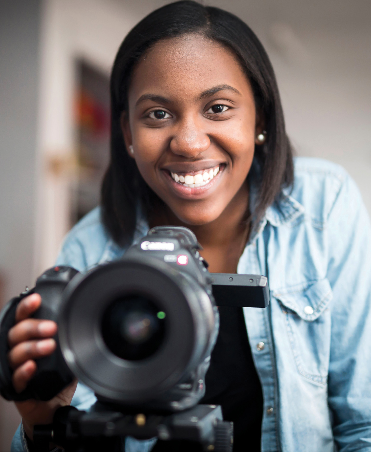 photo of Briana Francois holding a camera