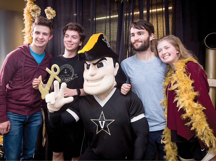 Students pose with Mr. Commodore at this year's Anchor Down Day prior to Giving Day. Photo by Susan Urmy