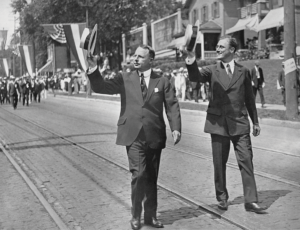 Presidential candidate James M. Cox, governor of Ohio and founder of Cox Enterprises, left, leads the Ohio Democratic Notification Parade in Dayton, Ohio, in 1920 with vice presidential candidate Franklin D. Roosevelt. (BETTMANN/GETTY)