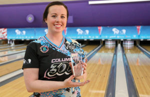 photo of Josie Barnes with a trophy