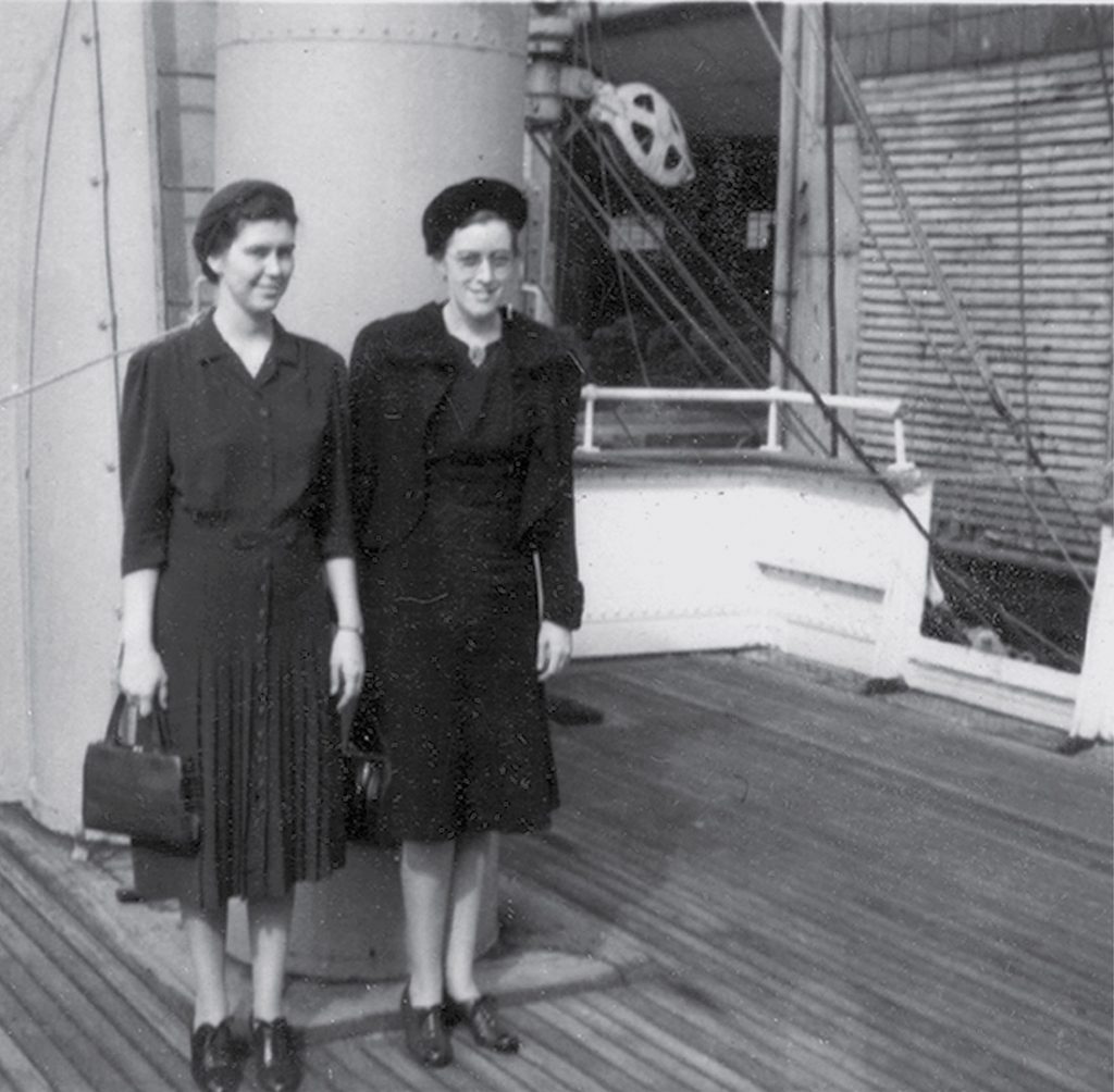 Lois Gunden Clemens, left, and her friend Helen Penner aboard the SS Excambion headed for France in October 1941. (COURTESY THE MENNONITE CHURCH USA ARCHIVES, GOSHEN, INDIANA)