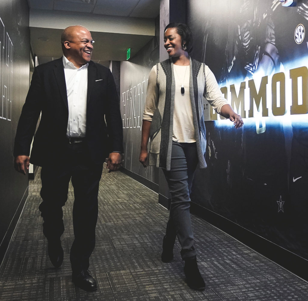 photo of Malcolm Turner and Candice Lee walking down a hallway at the McGugin Center