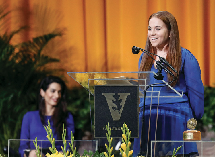 Senior Class Fund Chair Claire Fogarty, BS'18, presents the Class of 2018's record-breaking donation during Senior Day Activities May 10. Photo by Joe Howell