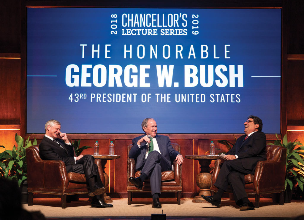 photo of President George W. Bush, Chancellor Nicholas S. Zeppos, and John Meacham talking on stage